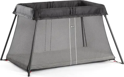 A black and gray BabyBjörn travel crib is shown on a white background.