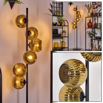 Produktbild von Villamare Stehlampe aus Metall/Riffelglas in Schwarz/Goldfarben