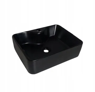 A black rectangular washbasin is shown from a diagonal angle against a white background.