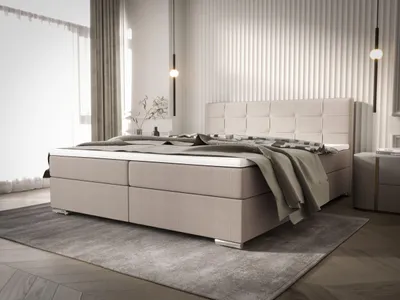 A bedroom setting with a bed as the main focus.