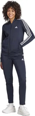 A woman wearing an Adidas tracksuit.