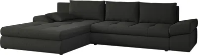A dark gray sectional sofa with tufted cushions and a chaise lounge, shown from a side-angle against a white background.