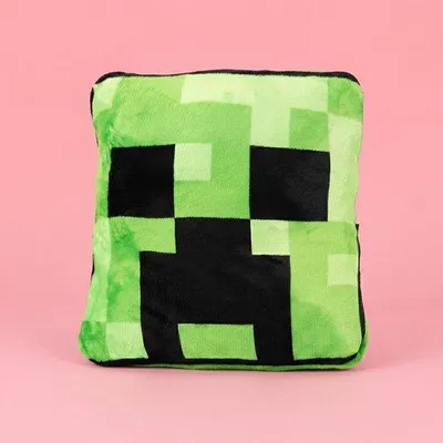 Imagen del producto de Manta de Minecraft con diseño de Creeper e incluye una almohada
