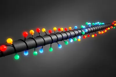 Immagine prodotto di Konstsmide - Globelichterkette a LED, diodi rotondi grandi, 80 diodi colorati, trasformatore per esterni da 24 V, cavo nero ; 3696-507