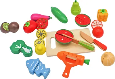 A collection of wooden toy fruits and vegetables, some of which are cut in half, arranged on a white background.