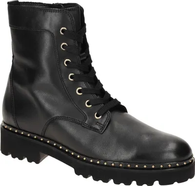 A single black leather boot with laces and gold-colored eyelets and studs on the sole.