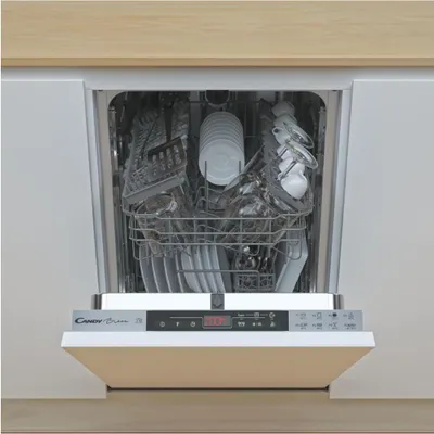 An open dishwasher filled with dishes, viewed from the front.