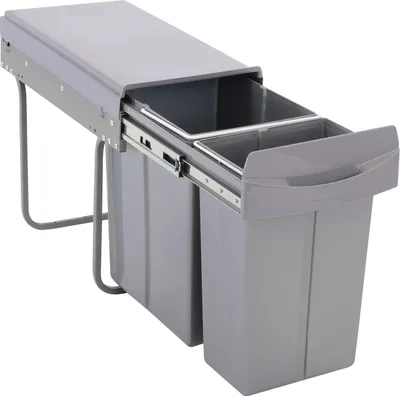 A pull-out trash bin system with two compartments.