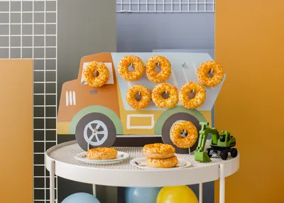 Produktbild von Aufsteller Kipplaster 61x38cm Donuts Ständer 10 Haken Blau / Orange