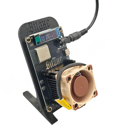 Immagine prodotto di Bitaxe 601 Gamma 100 % silenzioso - Versione silenziosa - Include supporto e spina UE - 1,2 TH/s - Bitcoin Mini Miner Kit - Versione 2025 - Nero
