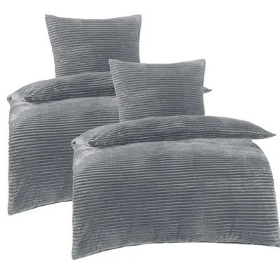 Two sets of bedding, one on top of the other, are displayed against a white background.