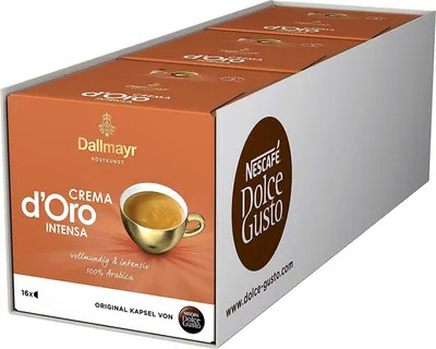 A cardboard box containing multiple packs of Nescafé Dolce Gusto coffee capsules.