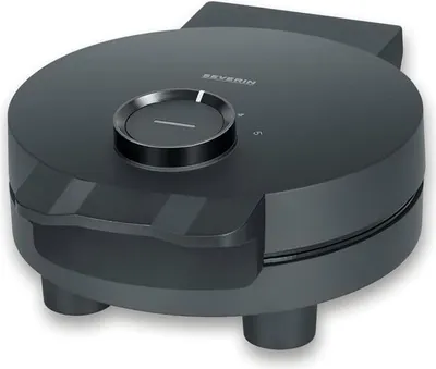 A black waffle maker is shown from a diagonal angle against a white background.