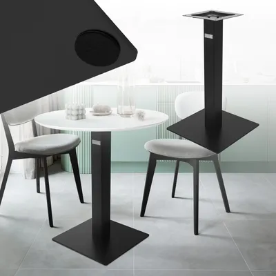 A black table base is shown in a modern dining room setting with a white table and chairs.