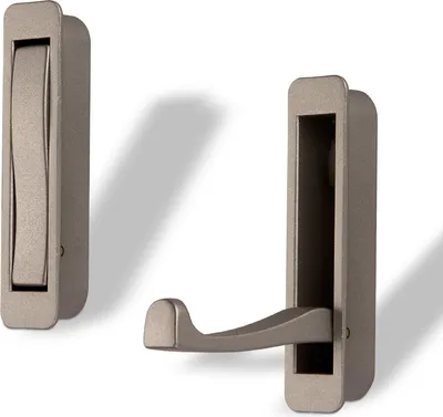 Two metallic hooks on a white background.