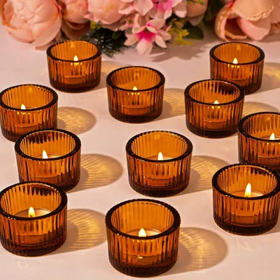 Immagine prodotto di Portacandele in vetro per candele a forma di lumino - Set da 12 - Candeliere - Scanalato - Ambra - Ideale per matrimoni