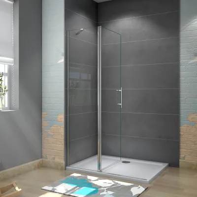 A modern bathroom with a glass shower enclosure.