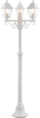 A white outdoor lamp post with three lights.