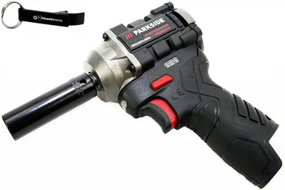A cordless impact wrench and a keychain are displayed against a white background.