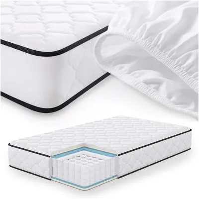 A mattress with a cutaway showing its internal layers, and a separate mattress protector.