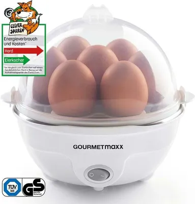 A white egg cooker filled with eggs, displayed on a white background.