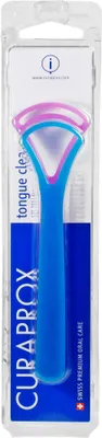 A product package for a Curaprox tongue cleaner.