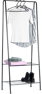 A black metal garment rack with two shelves, displaying clothing and shoes.