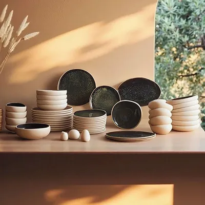 Produktbild von Hermia Concept, Geschirrset (55 Teile) aus Steinzeug, Weiß/Schwarz, 100% Qualität