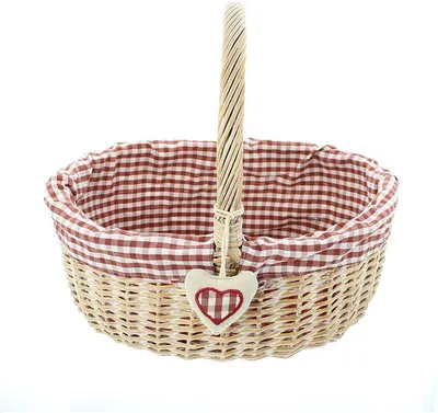 A woven basket with a red and white checkered lining and a heart-shaped charm.