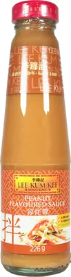 A bottle of Lee Kum Kee Peanut Flavoured Sauce against a white background.