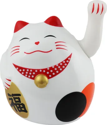 A white Maneki-neko cat figurine with red ears and collar, a gold bell, and a gold coin with Chinese characters on its chest.