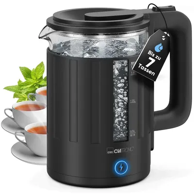 A black electric kettle with water boiling inside, shown next to three cups of tea and mint leaves.