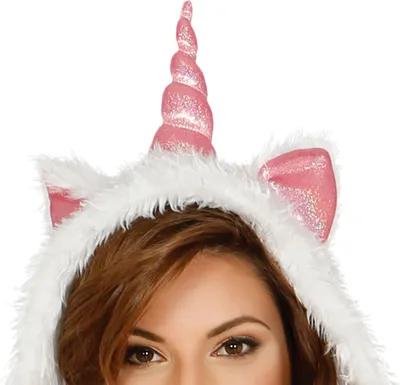 Close-up of a woman wearing a unicorn hood with ears and a horn.