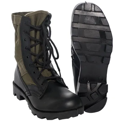 A pair of black and olive green jungle boots are shown against a white background. One boot is shown from the side, and the sole of the other boot is shown from the bottom.