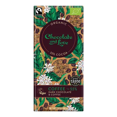 A chocolate bar with a decorative wrapper featuring coffee beans, leaves, and flowers.