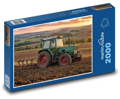 Obrázok produktu pre Puzzle 2000 Traktor v kopcovitej krajine - martinpuzzle