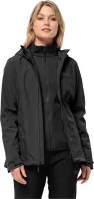 A woman wearing a black jacket and pants.