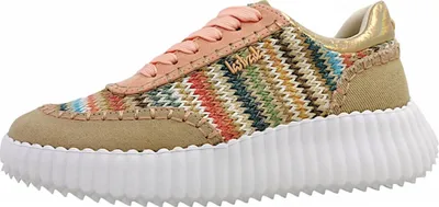 A side view of a single beige sneaker with a colorful zigzag pattern.