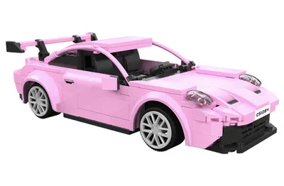 A pink toy sports car on a white background.
