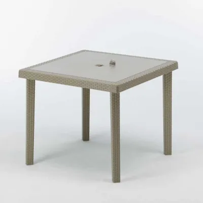 A square outdoor table with a woven rattan-like base and a smooth top, shown against a white background.