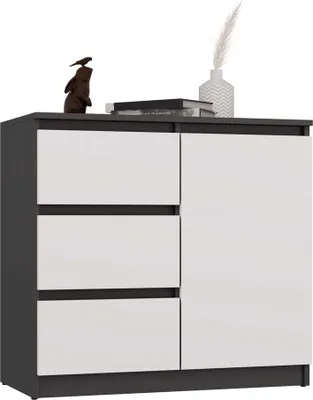 A modern dresser with three drawers on the left and a cabinet door on the right, set against a white background. Decorative items, including a small sculpture and a vase with dried reeds, are placed on top.