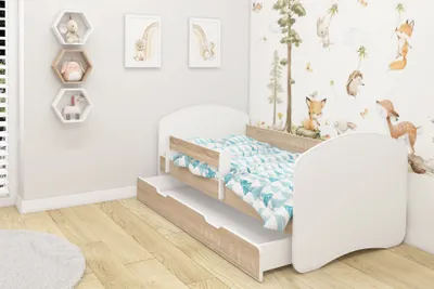 A child's bedroom with a bed and decorative elements.