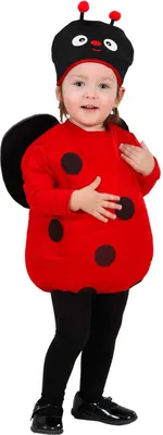 A young child wearing a ladybug costume.