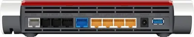 The back panel of a red and gray router with multiple ports.