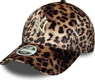 A close-up studio shot of a leopard-print baseball cap.