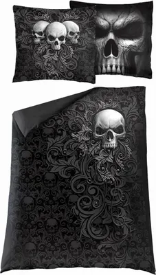 A bedding set with a skull motif, including a duvet cover and pillowcases.