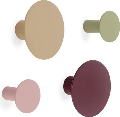 Four wall hooks in different colors arranged in a grid.