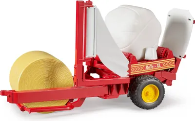 Immagine prodotto di avvolgitore per balle bruder con balla rotonda marrone ocra e nera