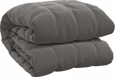 A folded gray weighted blanket.