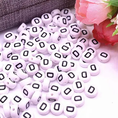 Image de Perles pour lettres, 30 pièces, 4x7 mm, blanc avec noir, rond, lettre D